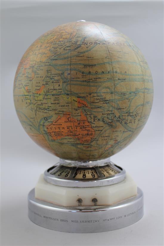 A Jaeger Le Coutre globe timepiece, height overall 10.5in.